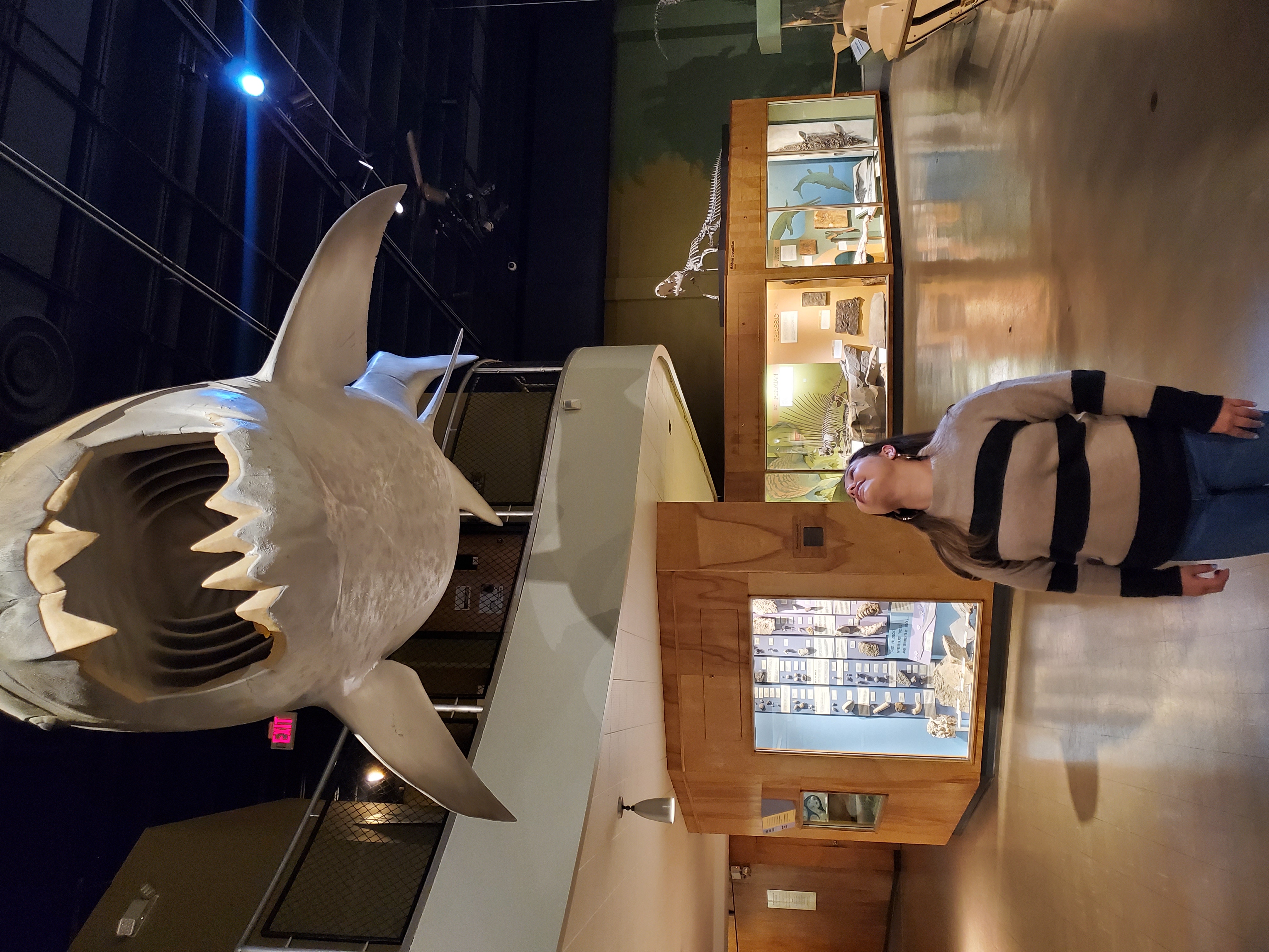 Adriana posing with prehistoric fish